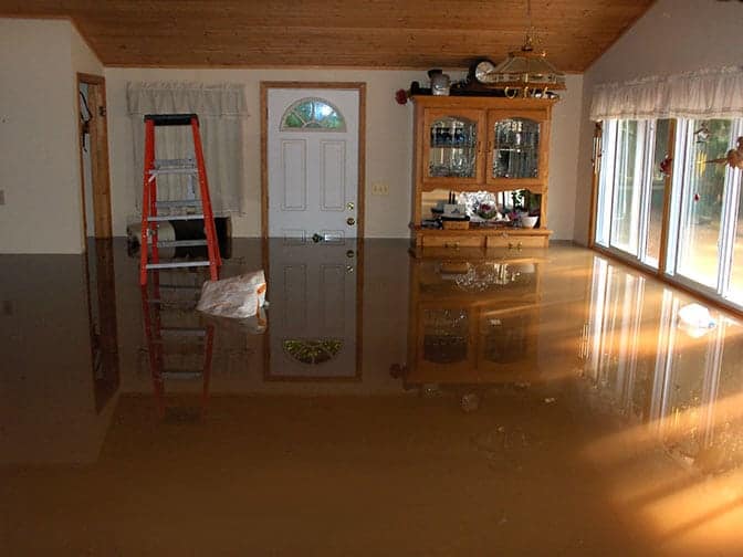 Photos of DianeTharp's home in the flood of 2006. COURTESY DIANE THARP DC
