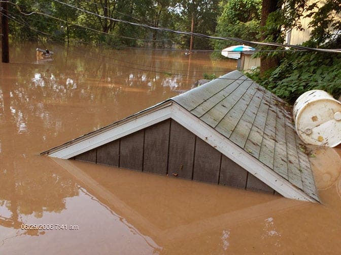 Photos of DianeTharp's home in the flood of 2006. COURTESY DIANE THARP DC