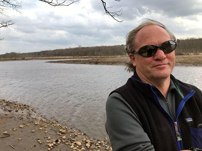 John Anderson, community activist, stands by the North Branch of the Rancocas Creek in Westampton, DC
