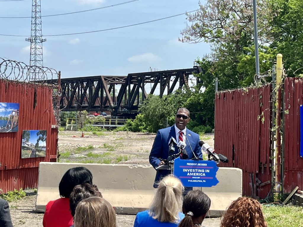 The EPA administrator, Michael Regan, near the banks of the Schuylkill River in Southwest Philadelphia on Monday. He announced more than $300 million in federal funding for 200 “brownfields” across the United States. That included $2 million to clean up a former oil transfer site near where Regan made his remarks, and $4.8 million to various other sites across the Delaware River Watershed. PHOTO BY KYLE BAGENSTOSE
