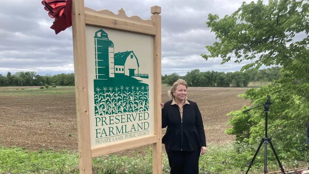 Susan Payne, retiring executive director of the State Agriculture Development Committee, New Jersey’s farmland preservation agency, at the 566 acres of Warren County farmland that was slated for warehouse development but has been purchased by the state, and will remain agricultural land in perpetuity. PHOTO BY JON HURDLE