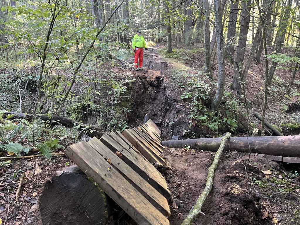 The bridge over a ravine on the Tusten Trail after being removed. PHOTO BY CLOEY CALLAHAN
