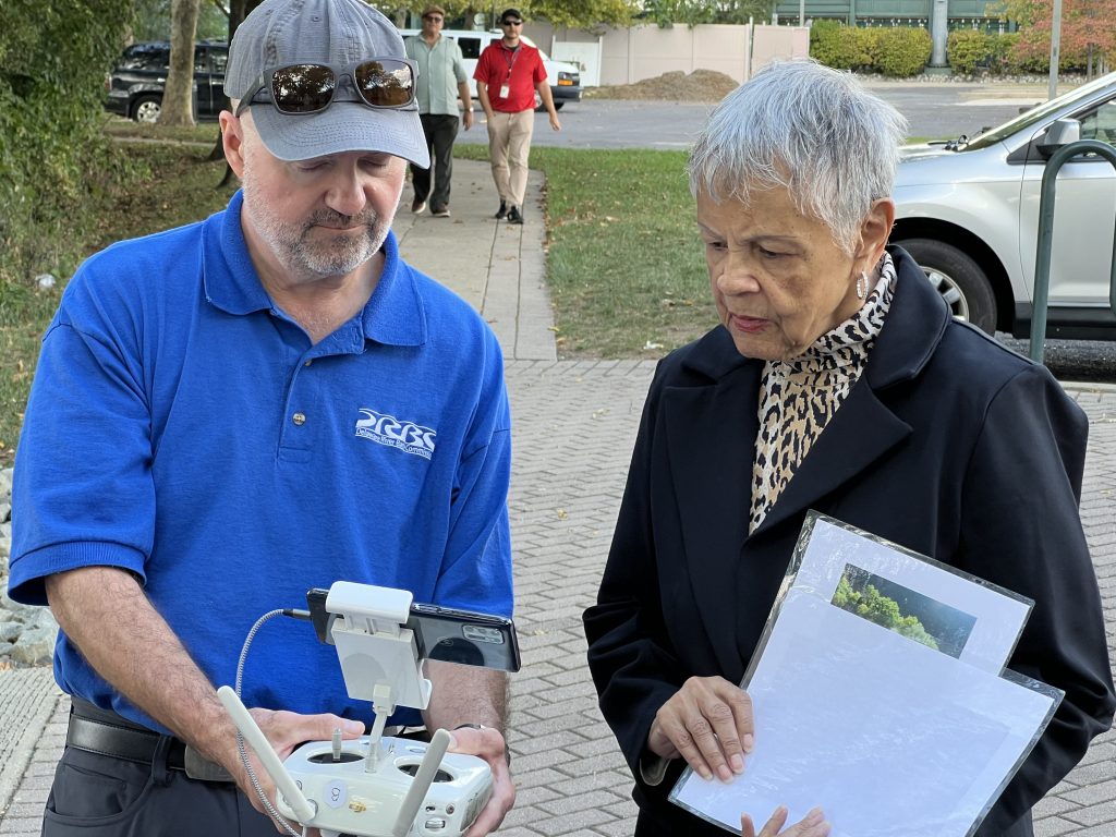 Man in blue shirt and woman