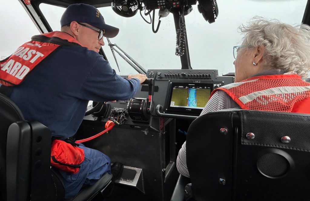 Meg Coast Guard 1 man and woman on a boat