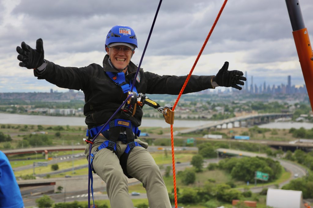GULP! Yes, that's Sparta, N.J., Mayor Neill Clark, about to rappel down a 21-story building, going "Over the Edge for Clean Water." Photo by Tyler Tierney, Hackensack Riverkeeper.