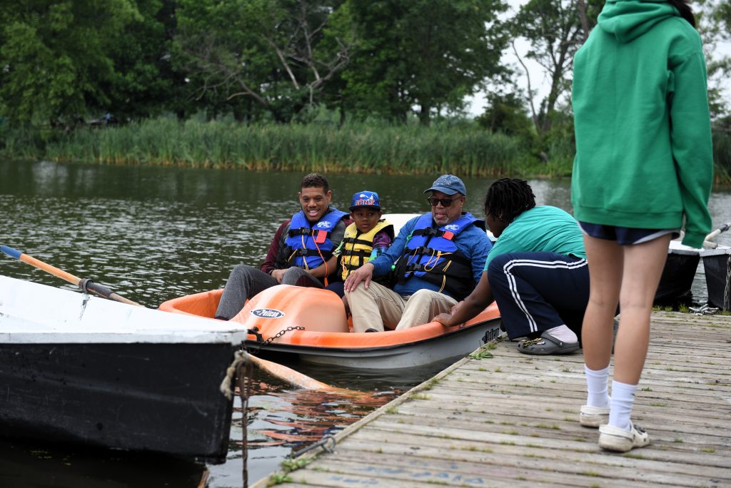 Family on a paddle boat