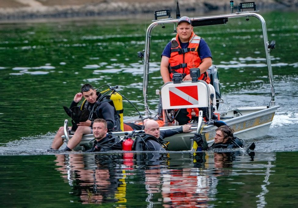 The Westfall Volunteer Fire Department dive team searches for Jeysson Ariel Osorio-Reyes on the afternoon of June 29. PHOTO BY PRESTON EHRLER 